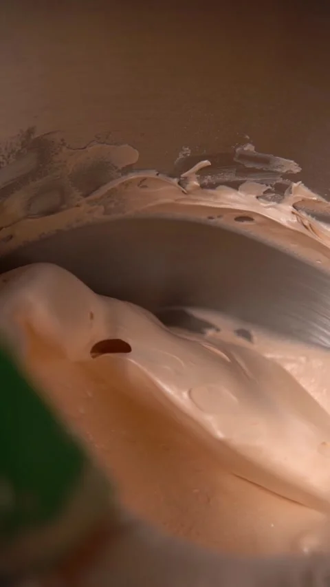 Chef works in the kitchen. Process of making dough for macaroons cookies. Slow m Stock Footage 294720442