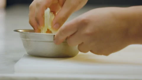 Chef wraps apple slices with sugar in an aluminum mold (close-up). Stock Footage 321384711