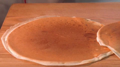 The chef wraps fried minced meat with mushrooms in pancakes Stock Footage 158021910