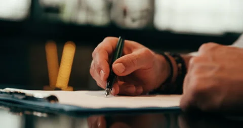 Chef writing down the recipes. Close up on hand Stock Footage 178485188