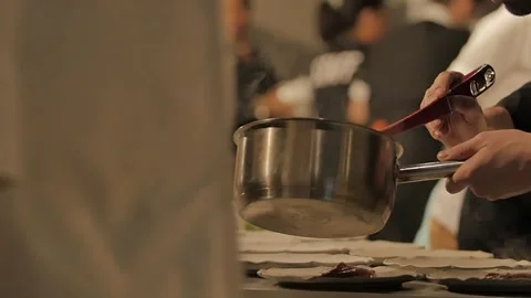 Cheffs working in a professional kitchen Stock Footage 272368547