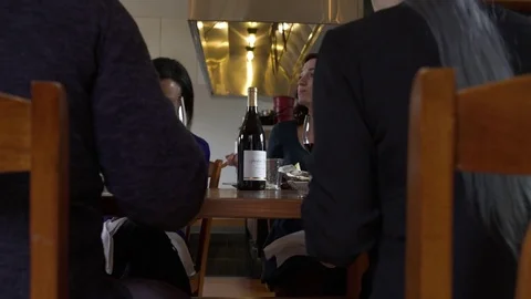 Chefs and students having a meal together Stock-Footage 77081903