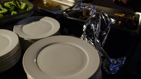 Chefs and waiters serve and serve meals in the restaurant Stock Footage 243488967
