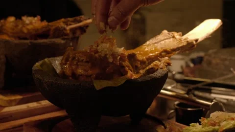 Chef's artistry unfolds as dish components are meticulously arranged on Stock Footage 246366339