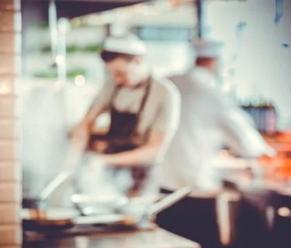 Chefs cooking in the kitchen Stock-Fotos
