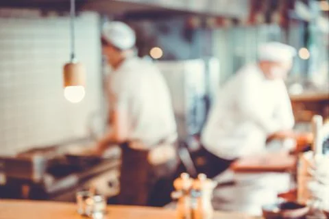 Chefs cooking in the kitchen Stock-Fotos