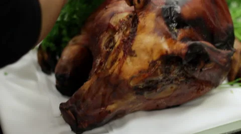 Chefs Dressing Roast Pig Video stock 61644896
