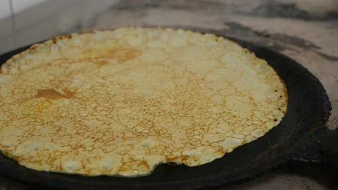 Chef's hands are preparing pancakes Stock Footage 148458954