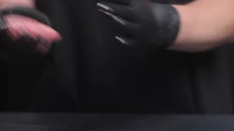 The chef's hands in black gloves form a hamburger patty. Video stock 228648893