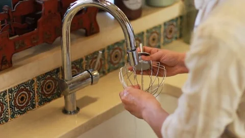 Chef's hands cleaning the mixer head  Stock Footage 74752136