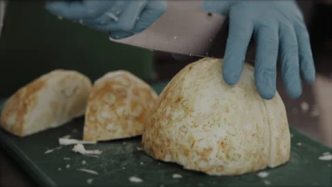 The chef's hands in gloves cut vegetables in the kitchen. food concept Video stock 149147390