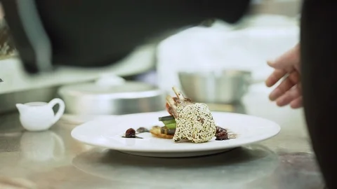 The chef's hands make chicken meat in sesame seeds Stock Footage 126013470
