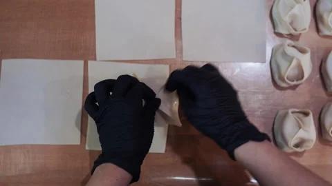 Chef's Hands Making Dumplings in Kitchen 库存影片 323096994