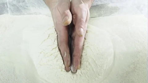 Chef's hands in the white flour Stock-Footage 71278630
