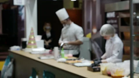 The chefs hold a master class for the audience. Stock Footage 151214695