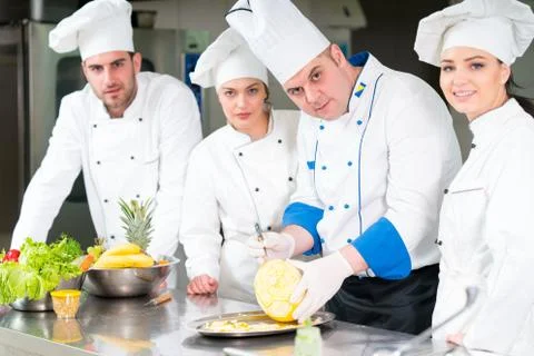 Chefs in the kitchen Stock Photos