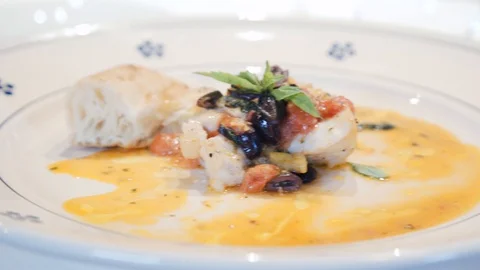 The chef's making a fish dish Stock Footage 113861597