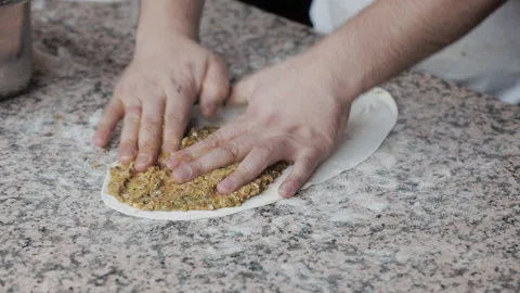A chef's making Lahmacun. Delicious Turkish Cuisine Stock Footage 147179082