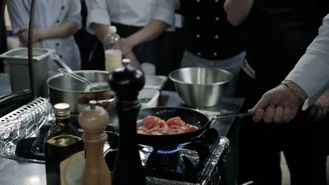 Chef's Masterclass. Chef Cooking With Fire In Frying Pan.
Professional Chef In a Stock Footage 71982690