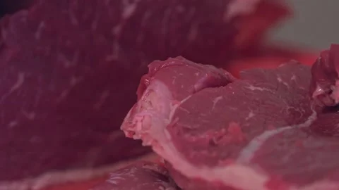 Chef's Precision: Slicing Grilled Beef for Delivery Containers – Close-Up Stock Footage 288690676