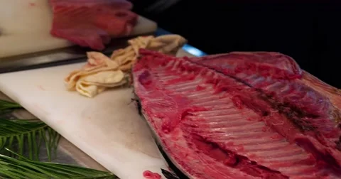 Chefs prepares bluefin tuna fish with spoon put into plate 4k video. Japanese Stock Footage 67487729