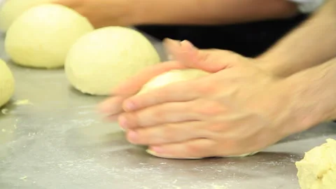 Chefs preparing bread dough detail shot Stock Footage 139106214