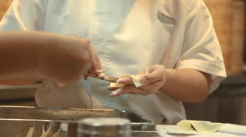 Chefs preparing food in kitchen Stock Footage 64994430