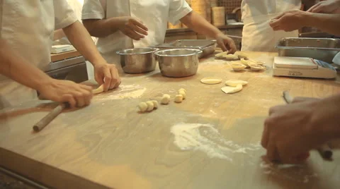 Chefs preparing food in kitchen Video stock 64995812