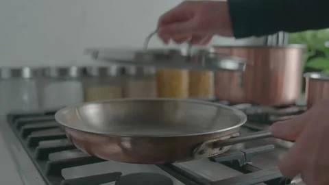 Chefs Removes Lid and Flips Frying Pan Stock Footage 149630947