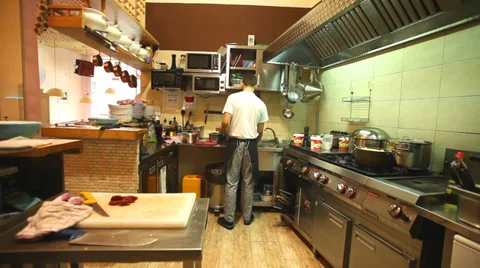 Chefs in the restaurant kitchen Stock Footage 35568846