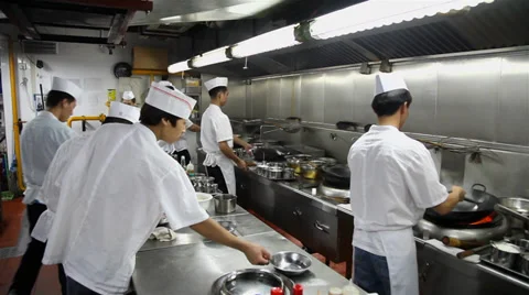 Chefs of a restaurant kitchen ,Xi'an city, Shaanxi province, China Stock Footage 36835389