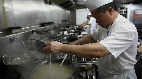 Chefs of a restaurant kitchen ,Xi'an city, Shaanxi province, China Stock Footage 36836851