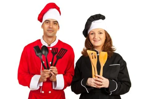 Chefs showing kitchen utensils Foto stock