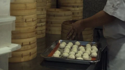 Chefs at work in kitchen Video stock 60587856