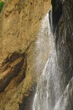Chegem waterfall falling from a cliff in the mountains Stock Photos