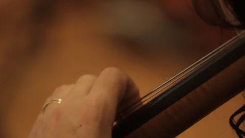 Chello player finger on fret Stock-Footage 86533872