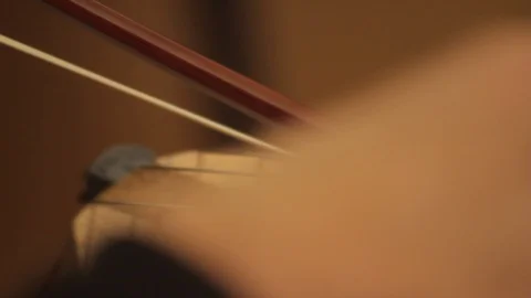 Chello playing bow close up Stock-Footage 86533194