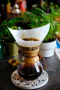 Chemex filter coffee brewing method. Brewing coffee at home. Concept for home Stock Photos