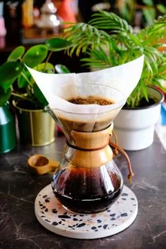 Chemex filter coffee brewing method. Brewing coffee at home. Concept for home Stock Photos