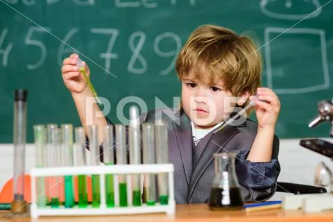 Chemical analysis. Talented scientist. Kid study chemistry. Biotechnology and Stock Photos