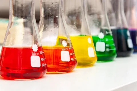 Chemical flasks with solution Stock Photos