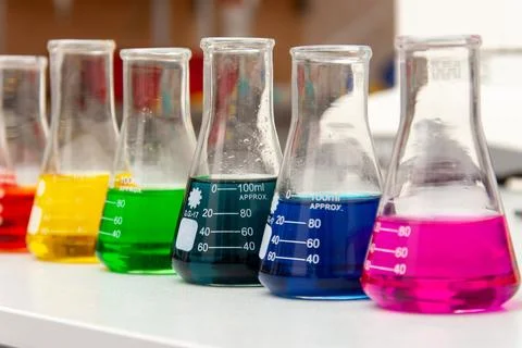 Chemical flasks with solution Stock Photos