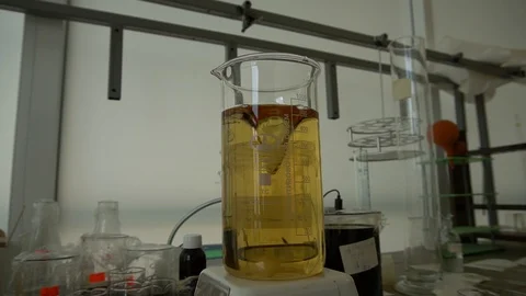Chemical laboratory experiments flasks with substances Stock Footage 129227509