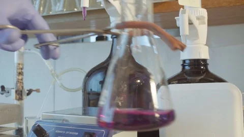 Chemical laboratory. Flask with boiling solution Stock Footage 91614704