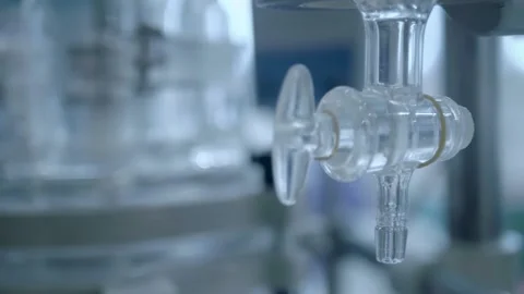Chemical reactor operation can be collected through special glass taps Stock Footage 340630151