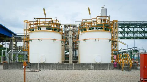 Chemical storage tanks equipped with complex measuring and control instrume.. Stock Photos