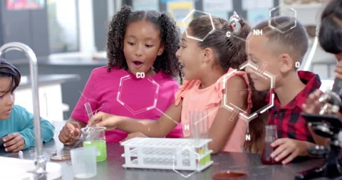 Chemical structures and elements over children conducting science experiment in Stock Footage 308840618