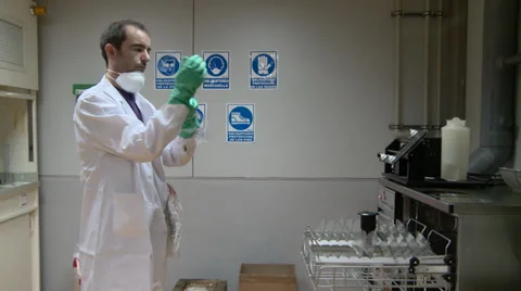 Chemical worker with gloves Stock Footage 33767795
