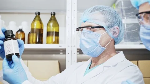 Chemist analyzing a chemical substance in the lab Stock Footage 84558165