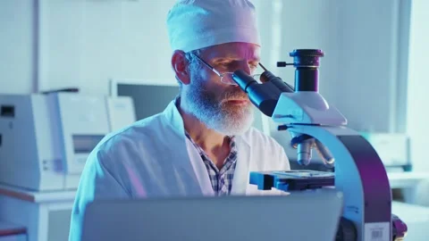 Chemist Analyzing Samples in Modern Laboratory Using Advanced Technology Stock Footage 282508341